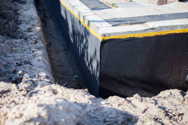 Professional Interior Drainage System technician working in New Lisbon, IN
